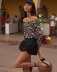 Zebra print coral top